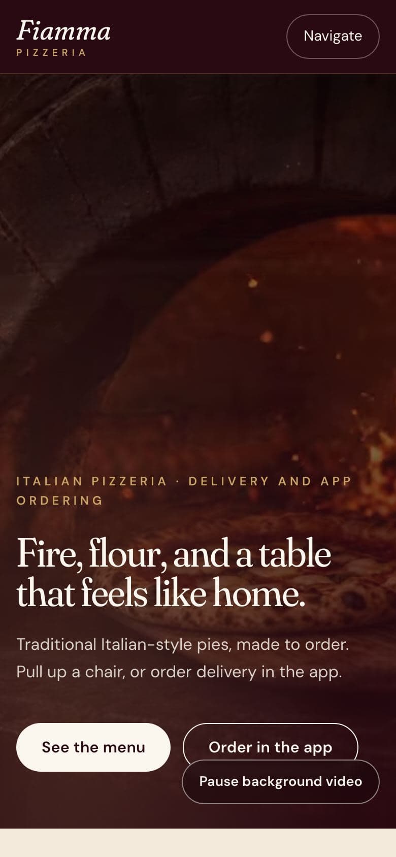 Haiku's homepage on a phone, with the Pause background video button overlapping the Order in the app button